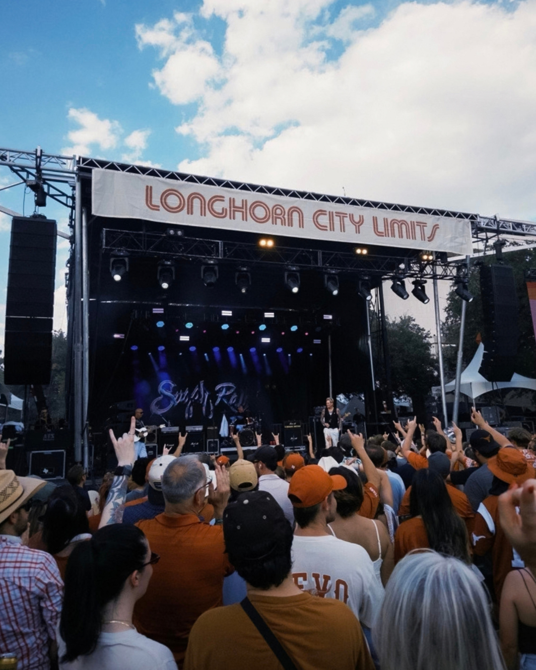 image of a crowd in front of a concert stage