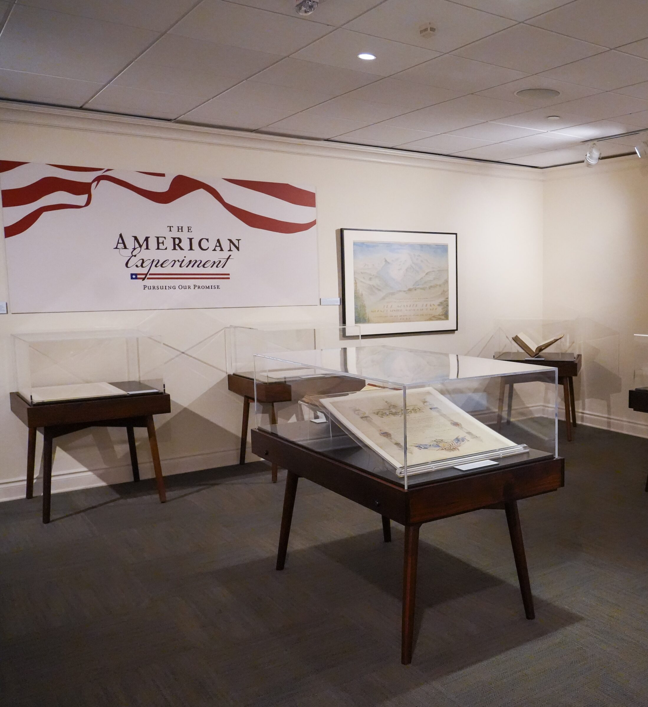 wide shot of exhibit room with display cases
