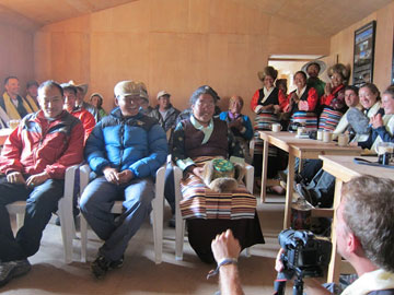 The researchers meet with residents living downstream of the lake