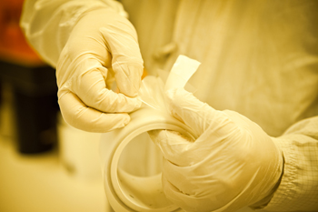 A close-up of the plastic substrate roll