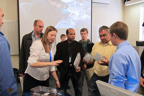 Katherine Brumbaugh, PhD candidate, talks to competition judges