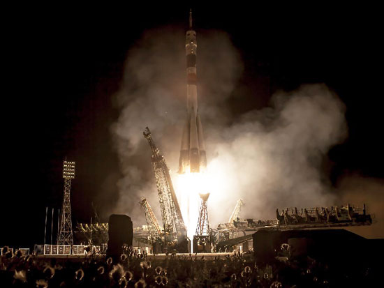 A Soyuz rocket with Expedition 36/37 Soyuz Commander Fyodor Yurchikhin of the Russian Federal Space Agency (Roscosmos), along with Flight Engineers Luca Parmitano of the European Space Agency and Karen Nyberg of NASA onboard, launches from the Baikonur Cosmodrome in Kazakhstan to the International Space Station on May 29, 2013, Kazakh time. Yurchikhin, Nyberg and Parmitano, will remain aboard the station until mid-November. Photo credit: NASA/Bill Ingalls