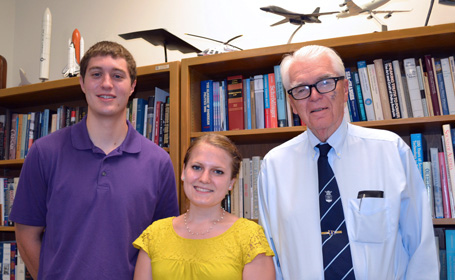 students Ryan Witte and Susanne Plaisted and Professor Hans Mark