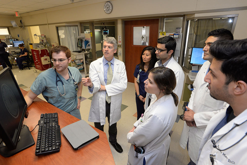 Dean Clay Johnston with medical students