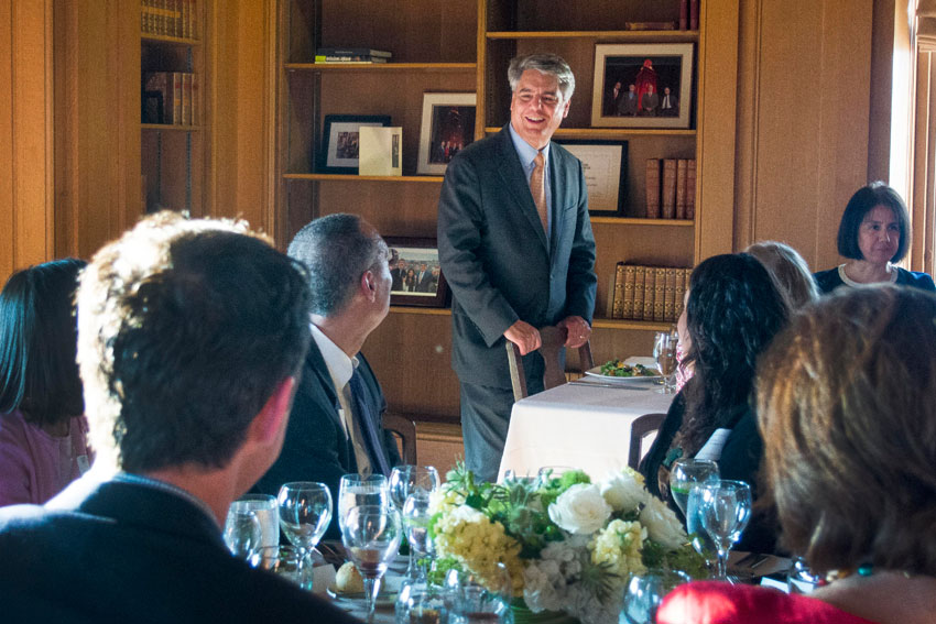 President Fenves enjoys dinner with members of the faculty in his office