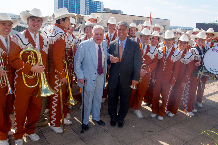 President Fenves greets Joe Jamail with the Longhorn Band
