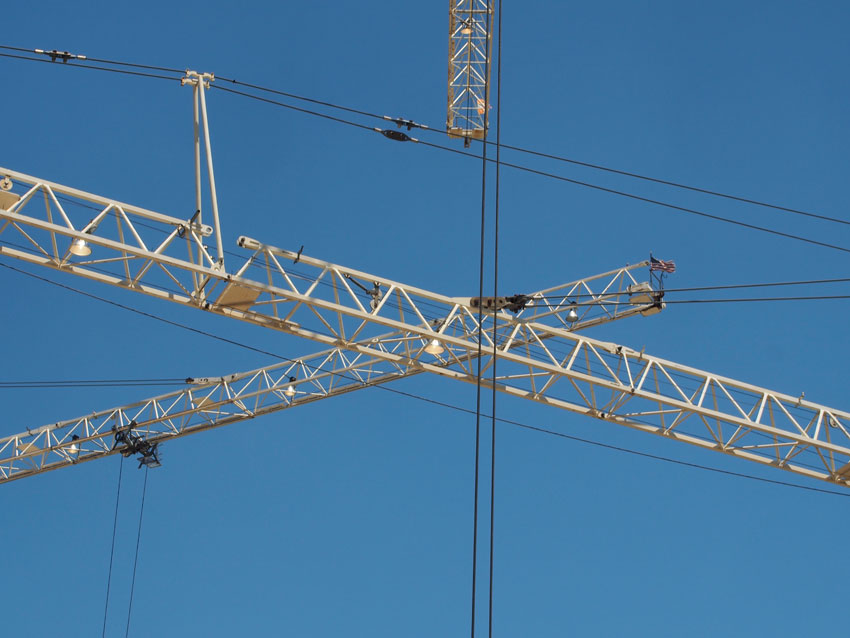 Overlapping cranes at the Dell Medical School construction site