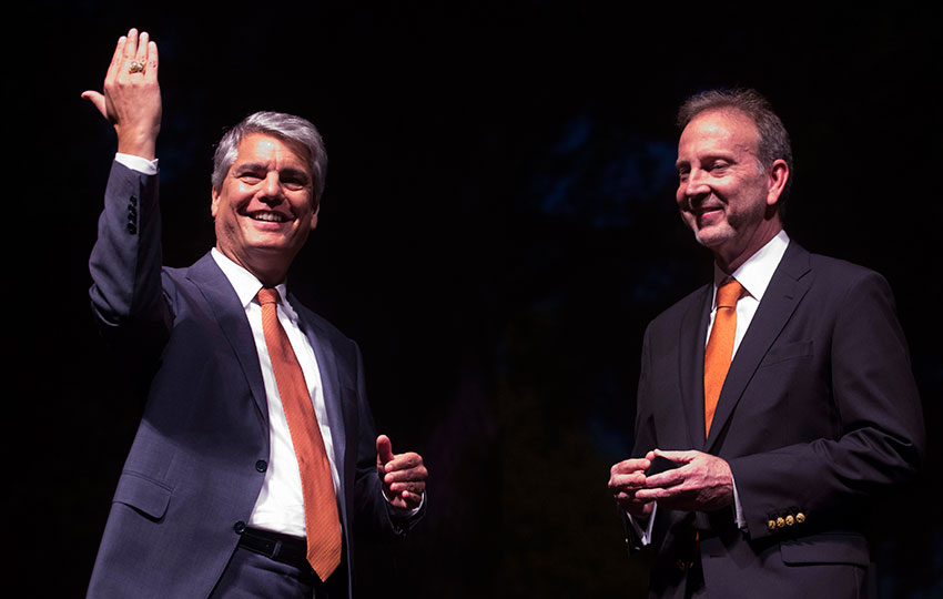 The Hon. Antonio Garza gives President Fenves the official University of Texas ring.