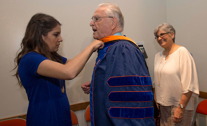 Hannah, Steve and Carmel Fenves prepare for the inauguration ceremony.