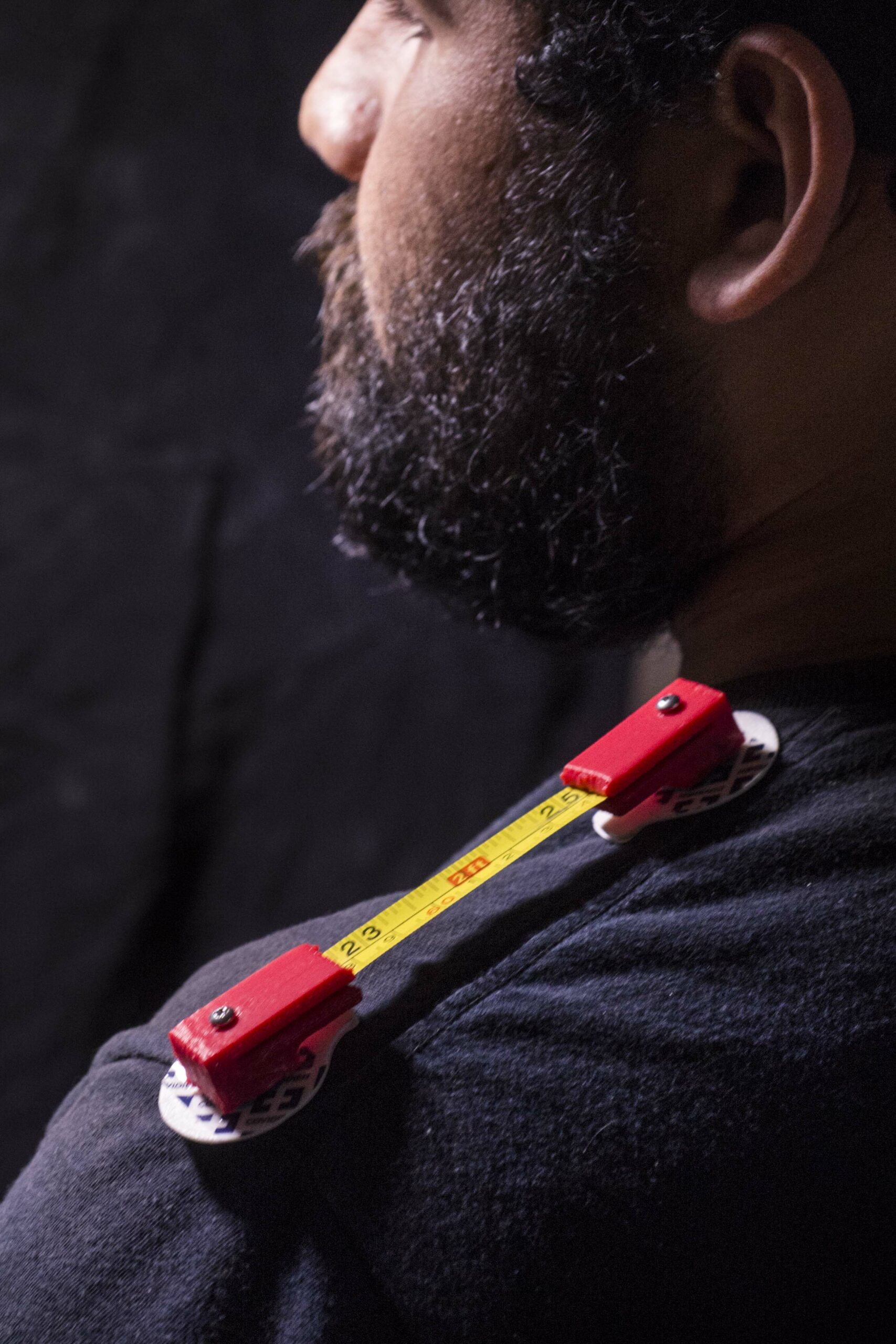 Jose Juan Mendez Jr., mechanical engineering senior, shows his invention that helps patients during shoulder rehabilitation