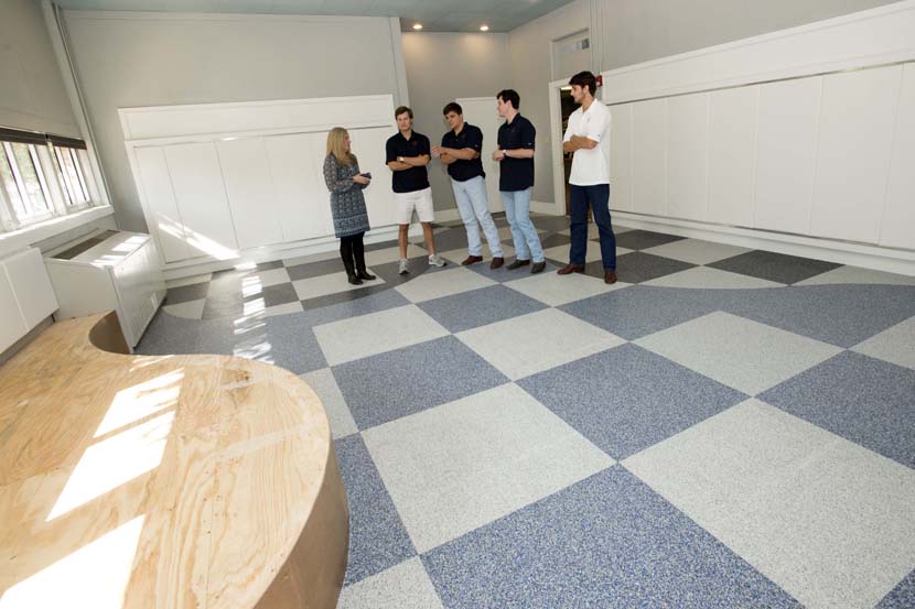 Principal Elizabeth Dickey show Texas Cowboys the new sensory room