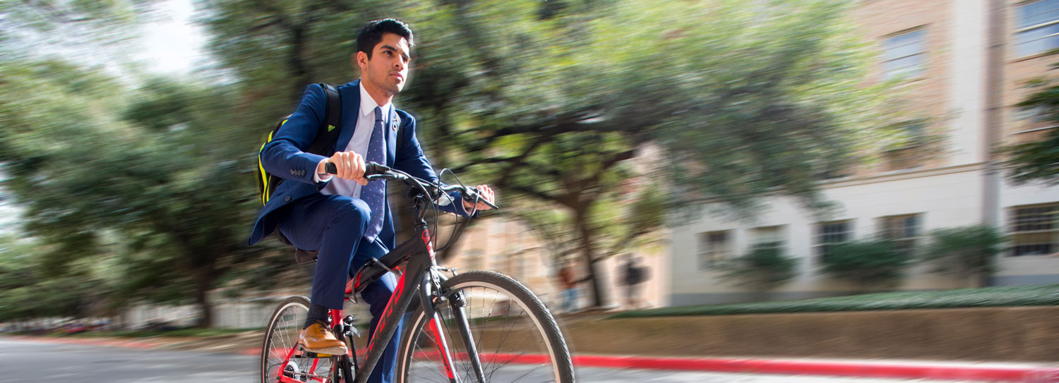 Karan Jerath riding his bike.