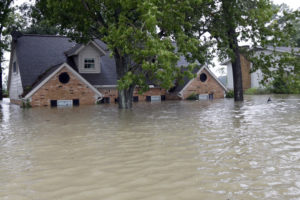 Home surrounded by floodwaters