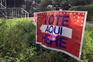 Voting sign outside the Flawn Academic Center (FAC)