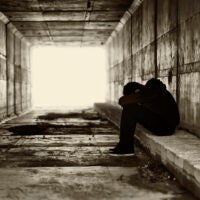 Silhouette of a boy in a tunnel