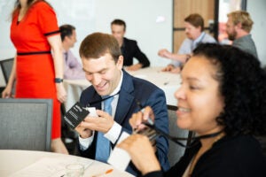 Delida Sanchez, an educational psychologist, sits next to molecular bioscientist Jeff Barrick.