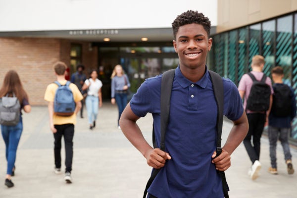 High School Student Outside Building