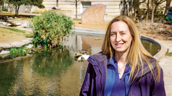 Carin Peterson stands by the UT turtle pond.