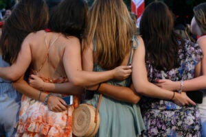 Friends posing for a photo at graduation.