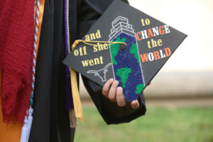 Graduation cap with lettering that says 
