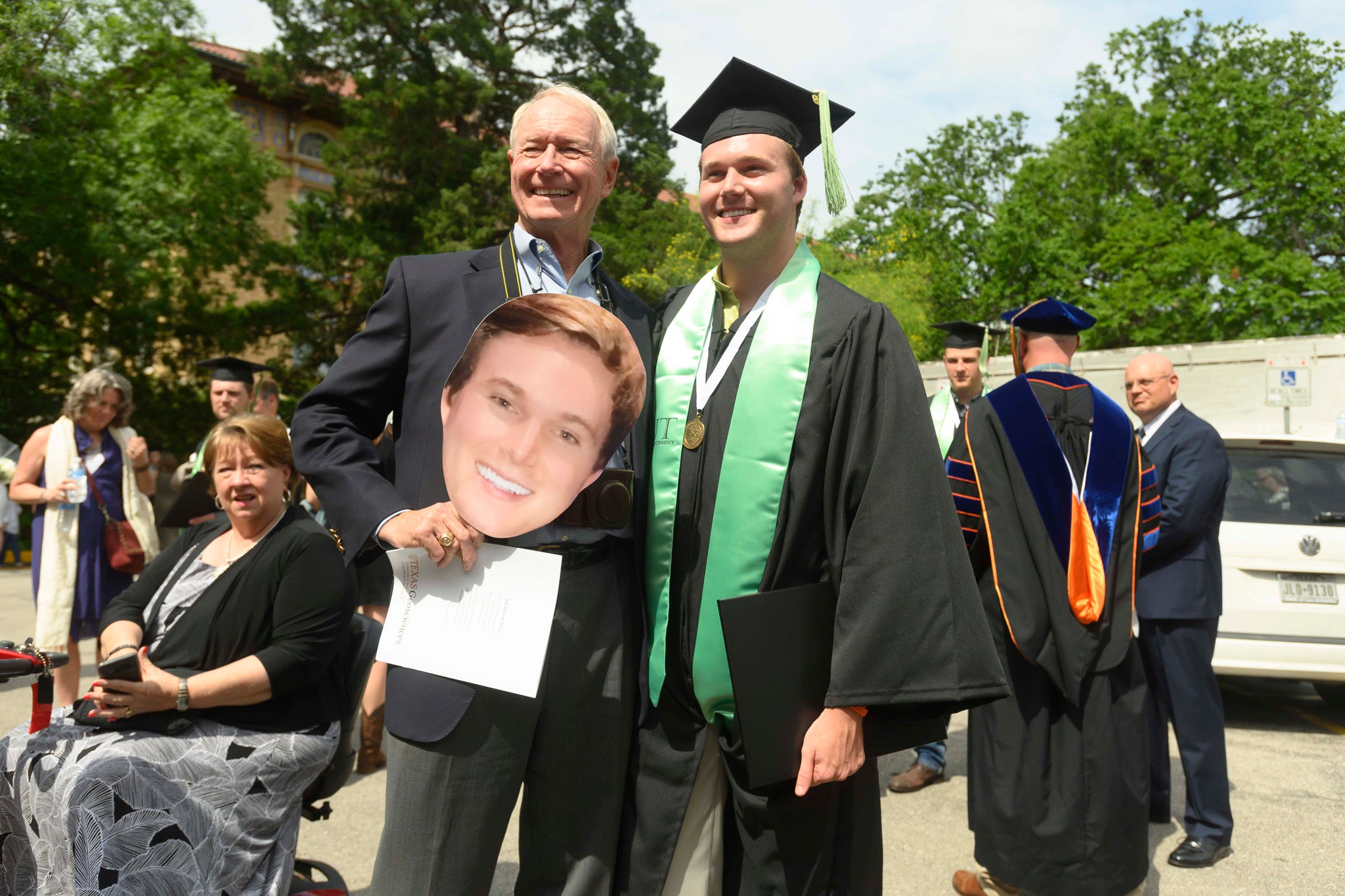 Father and son at graduation.