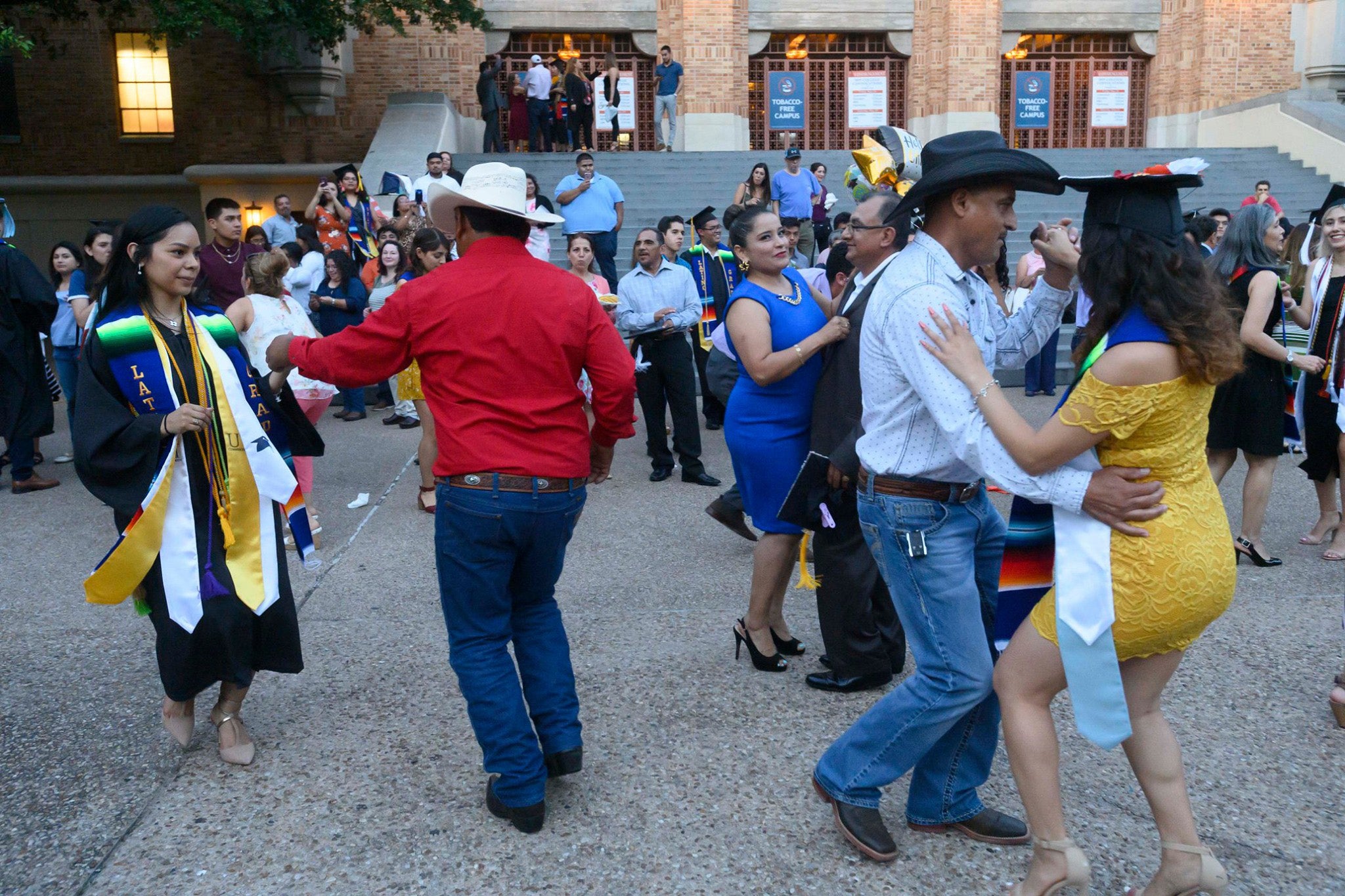 Families dancing at the LatinX graduation.