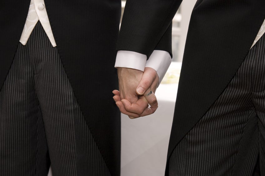 A same-sex couple holding hands