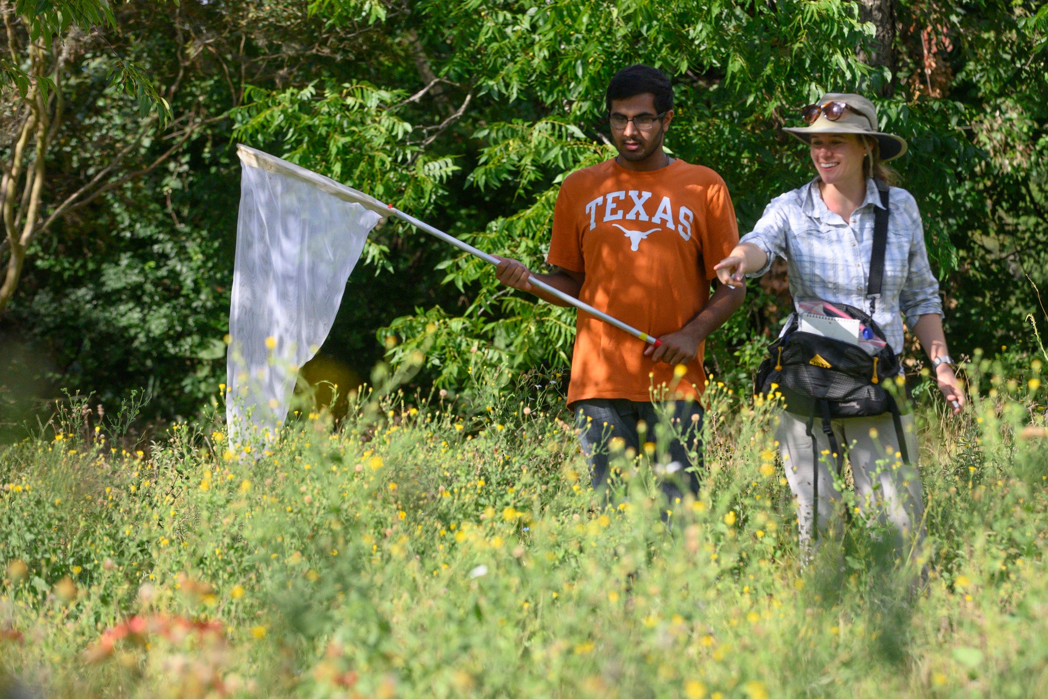 Freshman Research Initiatives pollinators 2019 The student is entering sophomore Sahran Hashim, shown here working with Professor Susan Cameron Devitt, at a site along Lady Bird Lake, west of Lamar Blvd. The student has a model release on file in University Communications for this story and any future, non-commercial use by UT. Freshman Research Initiatives pollinators 2019 The student is entering sophomore Sahran Hashim, shown here working with Professor Susan Cameron Devitt, at a site along Lady Bird Lake, west of Lamar Blvd. The student has a model release on file in University Communications for this story and any future, non-commercial use by UT.
