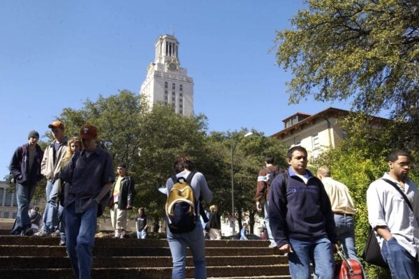 Tower and students between classes on the East Mall