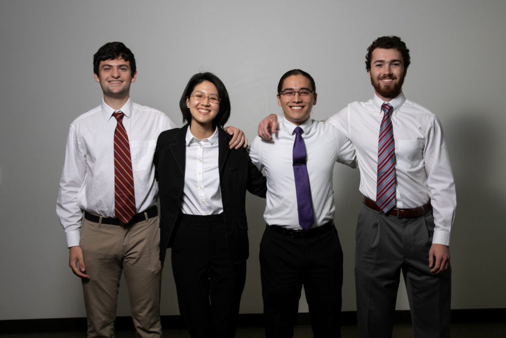 The autonomous vehicles in Japan team poses after their pitch