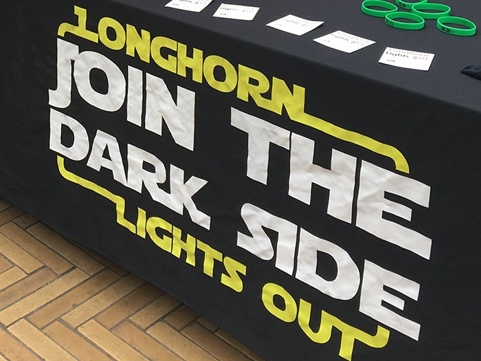 A photo of a Longhorn Lights Out sign.