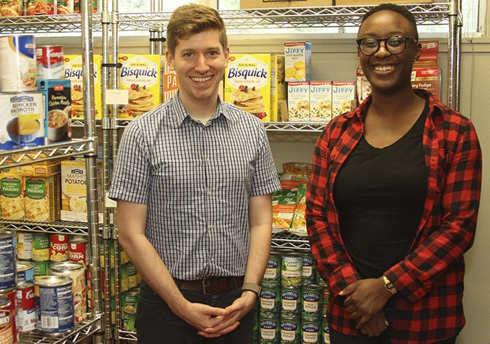 Will Ross, coordinator of Student Emergency Services, and Chinelo Agbim, a graduate student assistant with UT Outpost.