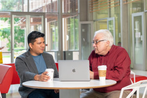 Capsenta founders Dr. Juan Sequeda and Professor Daniel Miranker discuss their work in the Gates Dell Complex Thursday July 11, 2019 on campus.