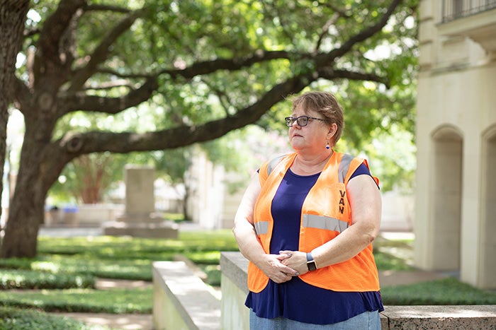 Andrea Zabcik wearing the orange vest used by volunteers with the Victims Advocate Network.