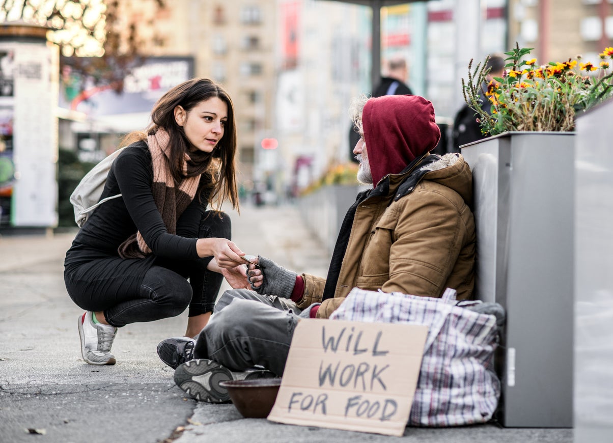 person helping homeless