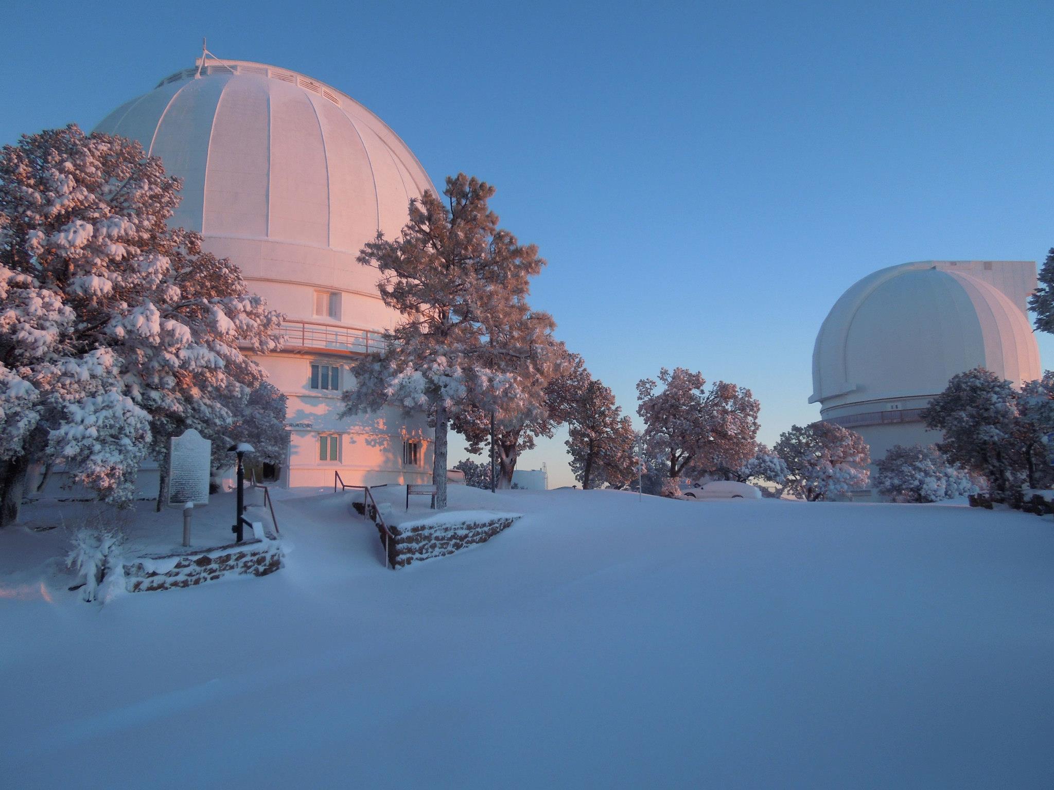A serene view of the McDonald Observatory blanketed in snow. Credit: David Doss/McDonald Observatory