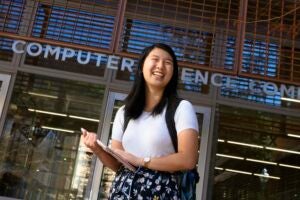 Rosaleen Xiong poses in front of the computer science building.