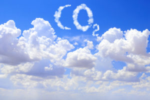 Symbol CO2 from clouds on blue sky