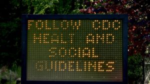 Follow CDC guidelines sign