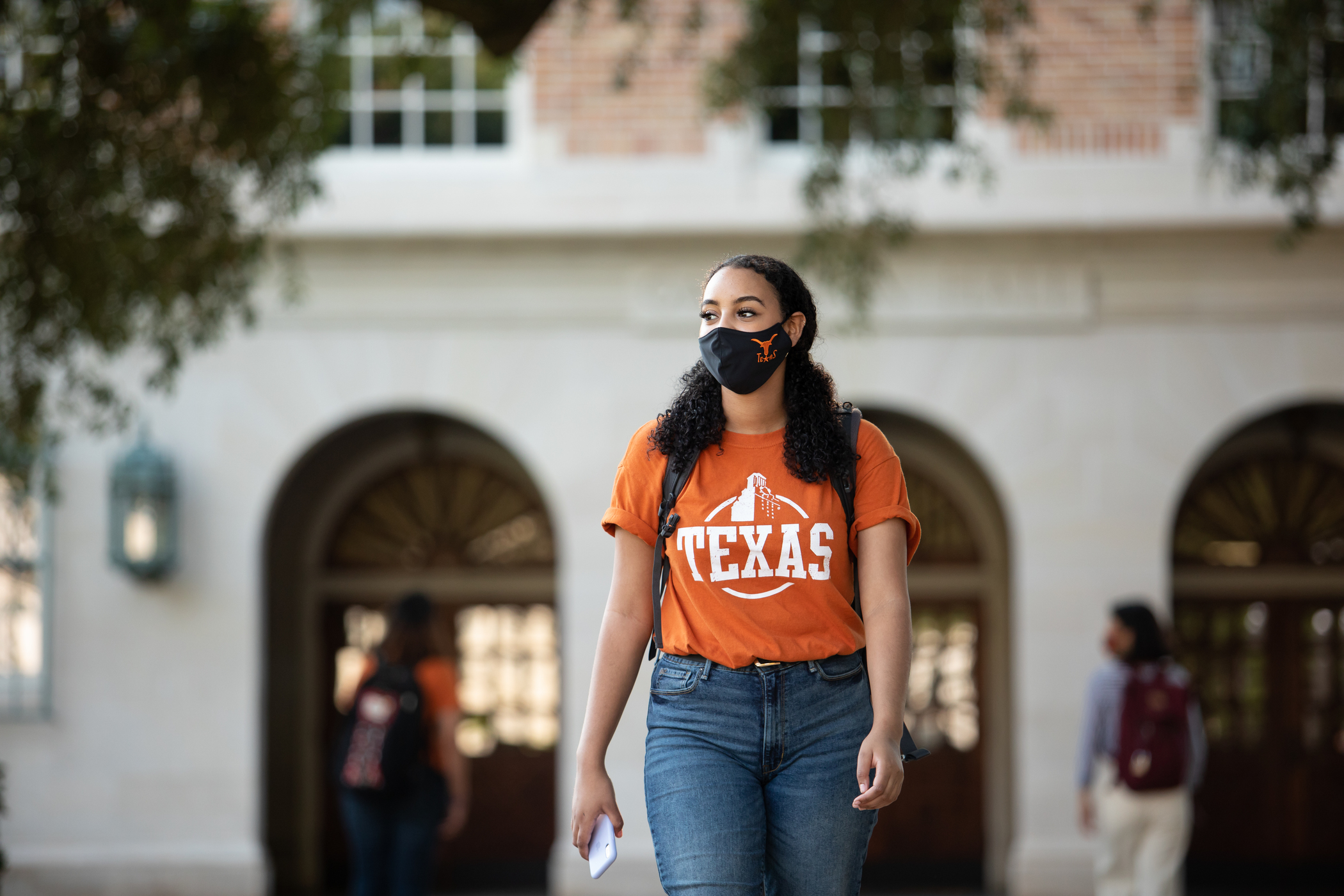 Students and staff members wear masks and keep their social distance during the fall reopening.