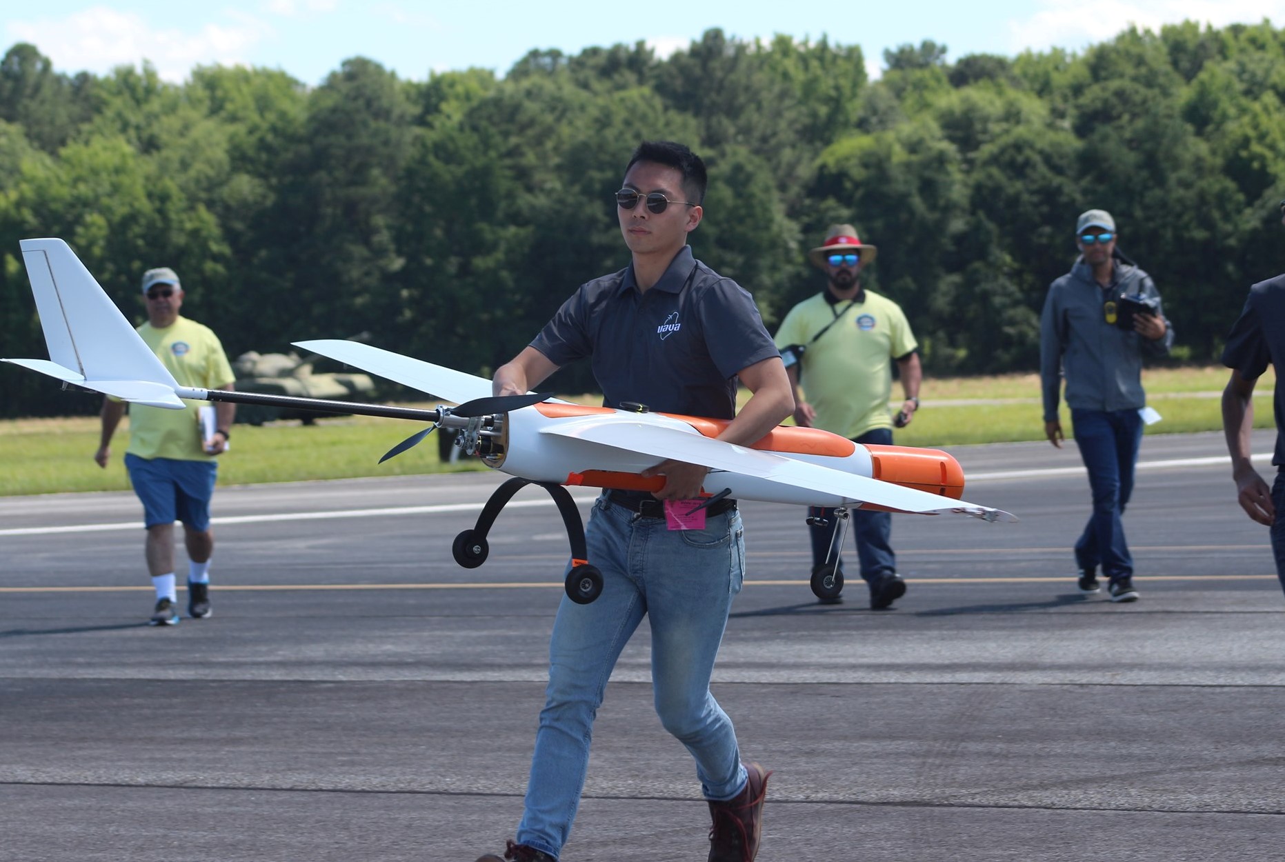 Hyeonseung “Shawn” Lee maneuvers Phoenix III, the competition aircraft of UT Austin’s Unmanned Aerial Vehicle Team.