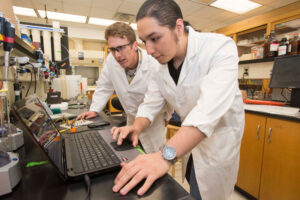 UT students in a lab