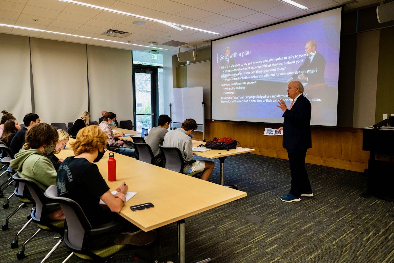 Karl Rove at front of classroom