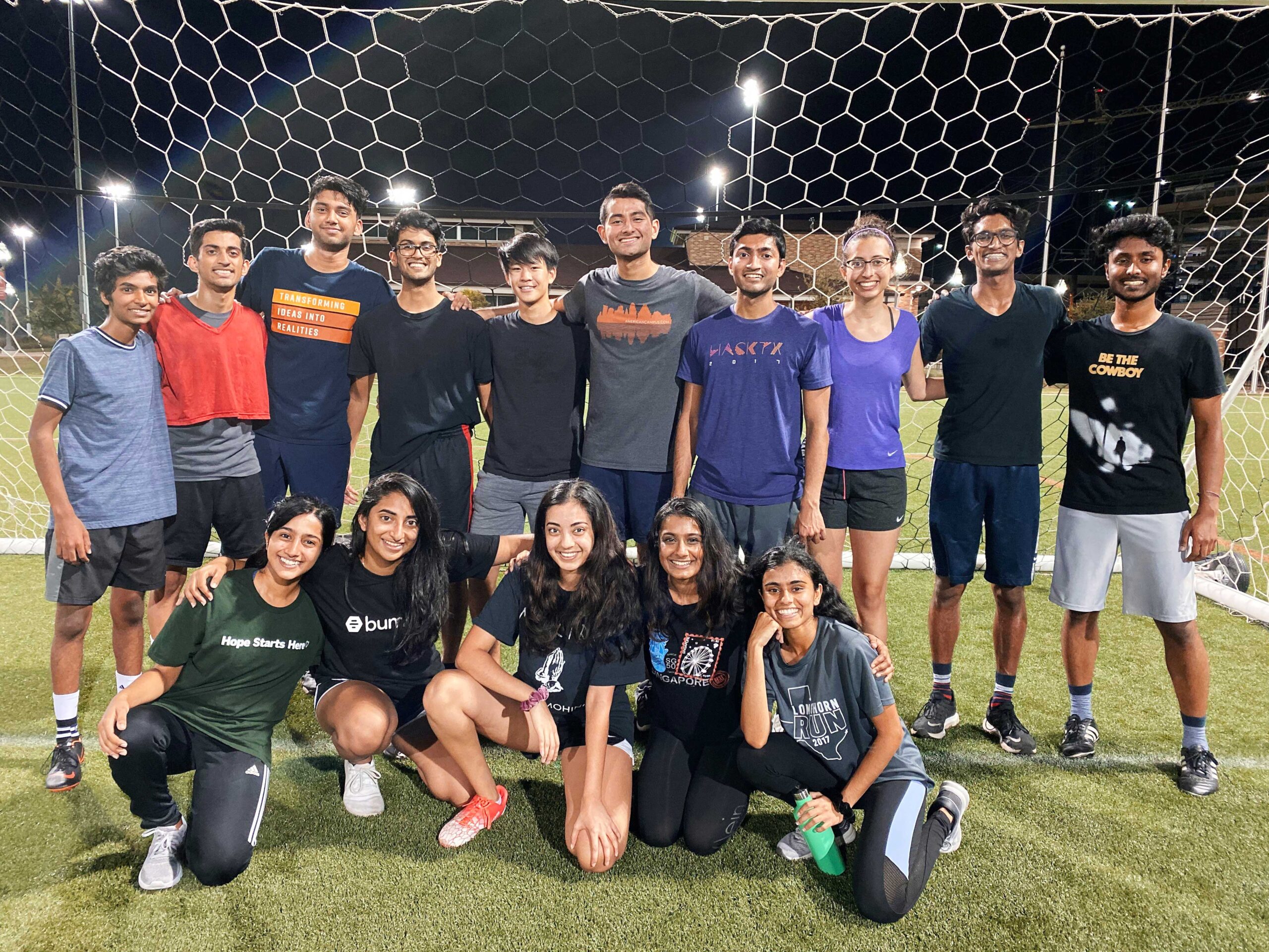 UT students on soccer field.