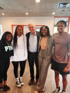 Kabbara and the NAACP chapter executive board pose with U.S. Rep. Lloyd Doggett 