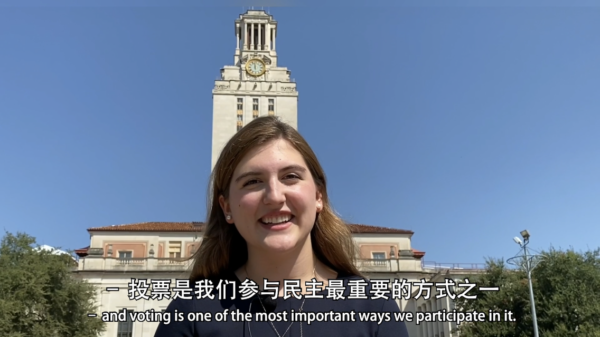 Soren Ettinger DeCou speaks in front of the Tower with Chinese subtitles