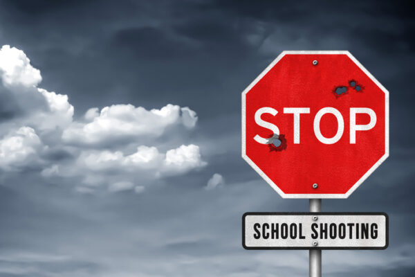Stop school shooting – road sign