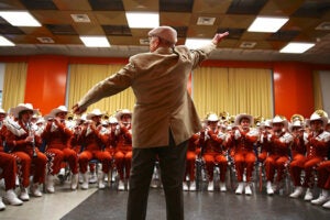 Director Emeritus Vincent DiNino guest conducts the Longhorn Band
