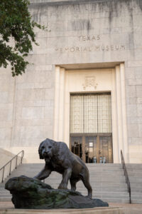 Saber-toothed cat statue outside museum's front door