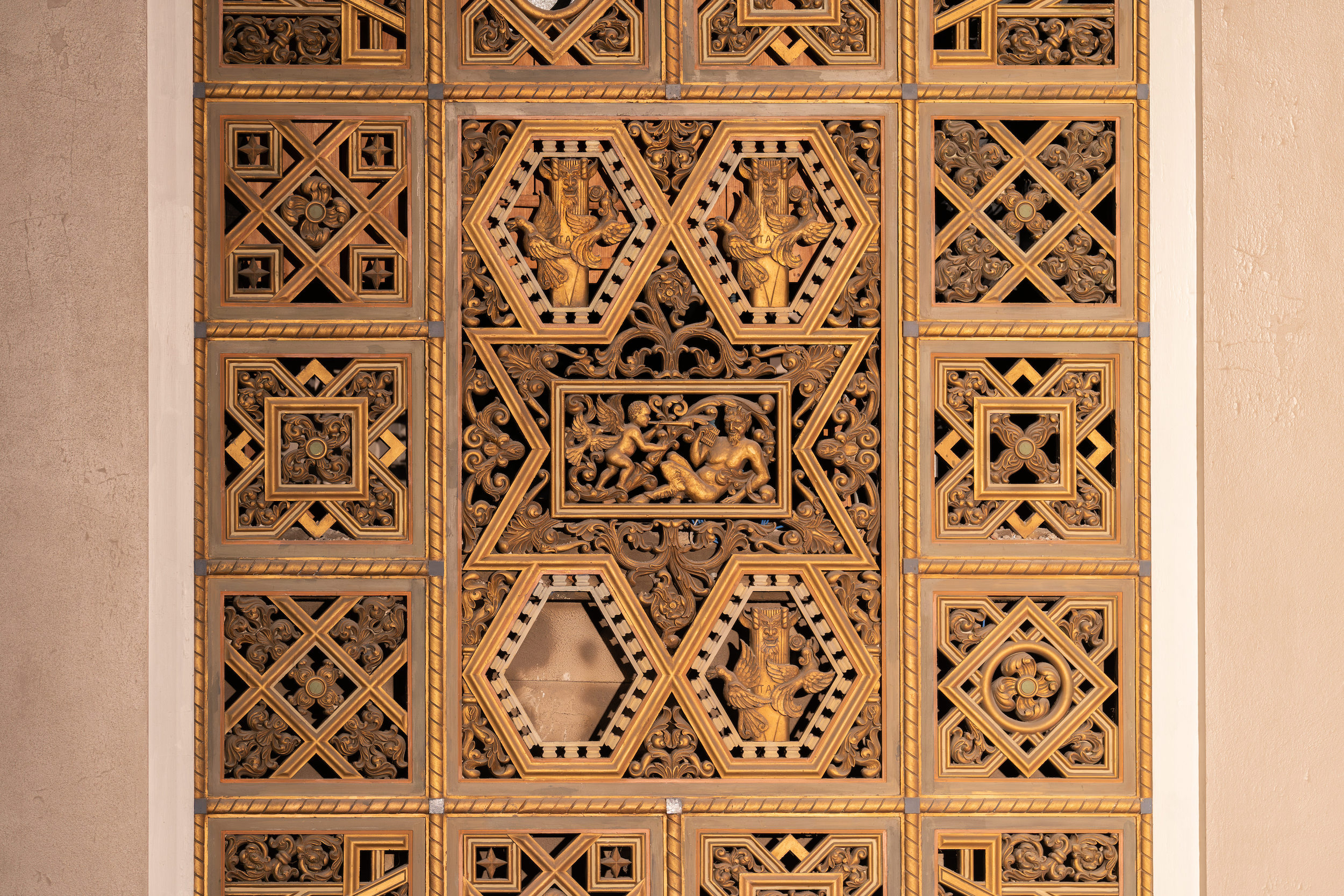 A section of the intricate plaster lattice that frames the stage and the balcony